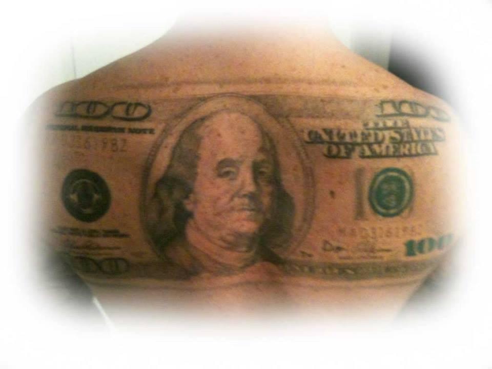 Hyper-realistic $100 bill tattoo by Ghost